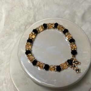 crystal and natural stone bracelet with a teddy bear charm
